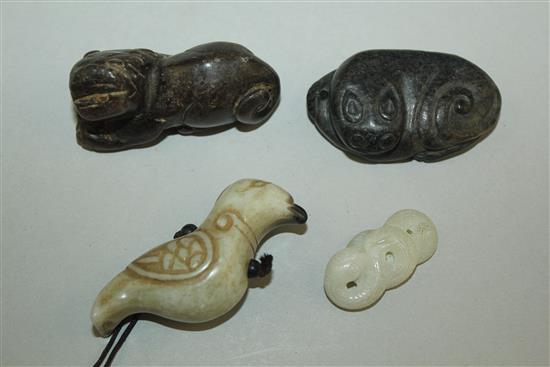 Four Chinese jade carvings, 19th/20th century or earlier, 5.2 and 5.5cm